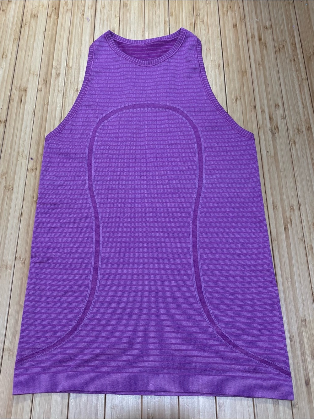 Lululemon high neck swiftly tank top. No tag. Size 4. EUC. Waist length.